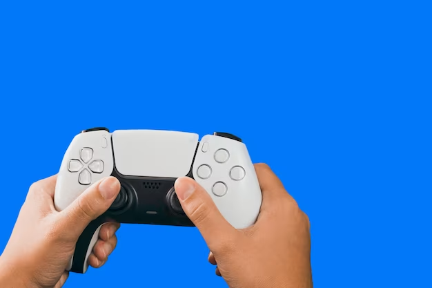 white and black game controller being held by hands