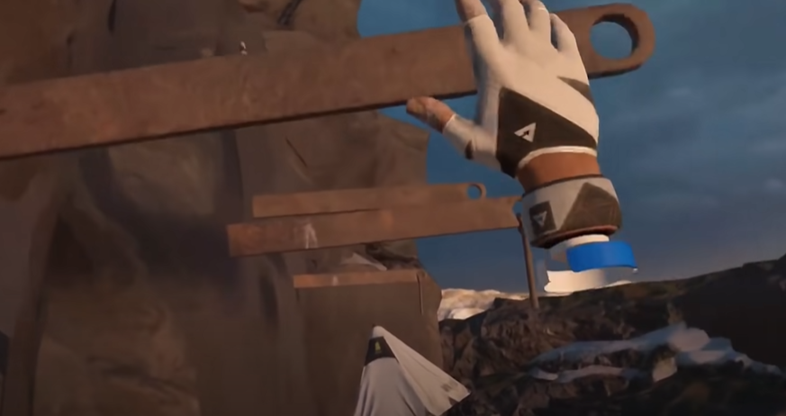 An image capturing gameplay from The Climb 2, showcasing a hand engaged in climbing