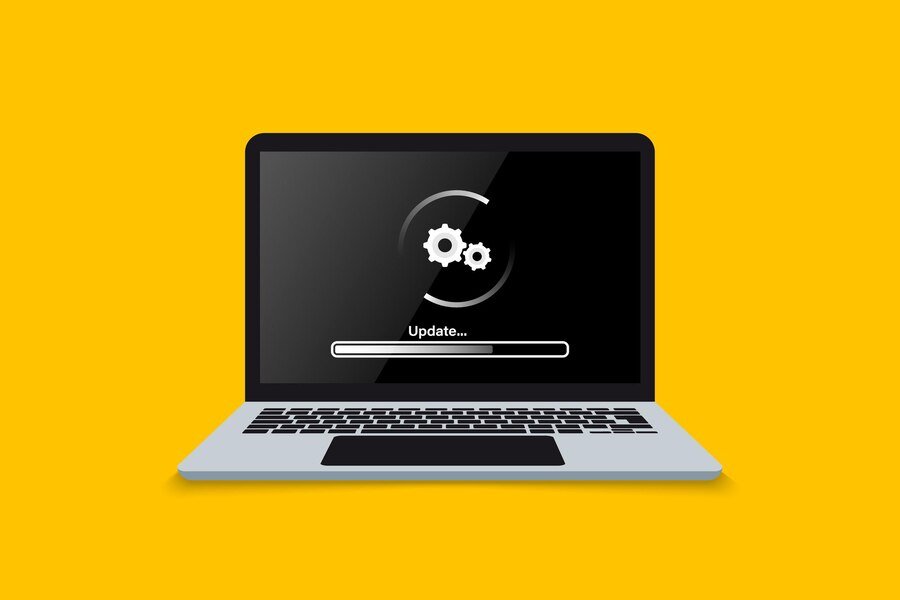 Laptop displaying loading screen during software update or operating system installation process